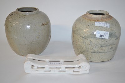 Lot 203 - Two Chinese pottery jars, one with a smokey...