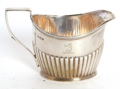 Lot 23 - A late Victorian small silver cream jug of...