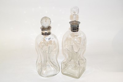 Lot 267 - Two glass decanters of dimple shape with...