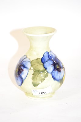 Lot 269 - A Moorcroft vase with the anemone pattern on a...