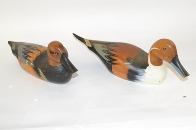 Lot 297 - Two wooden models of pintail ducks with...