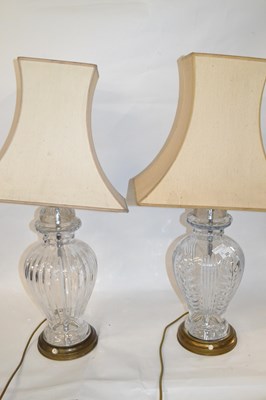 Lot 323 - Two large glass table lamps with shades, the...