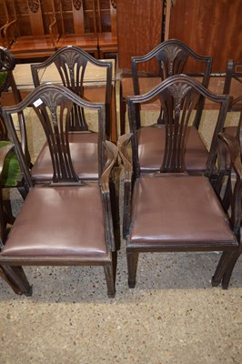 Lot 333 - A set of four Georgian Revival mahogany dining...