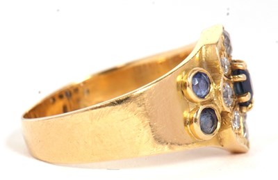 Lot 40 - A sapphire and diamond ring, set to centre...