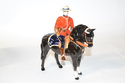 Lot 339 - A Beswick model of a Canadian Mountie astride...