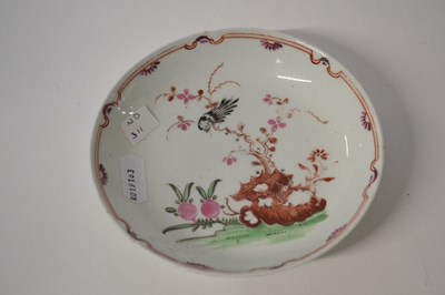 Lot 349 - A Lowestoft porcelain saucer in the black bird...