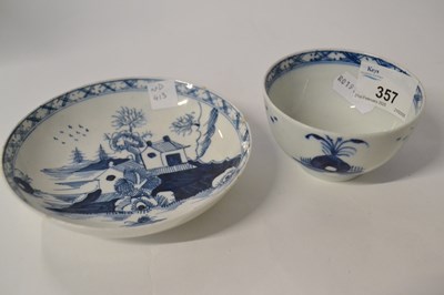 Lot 357 - A Lowestoft porcelain tea bowl and saucer with...