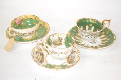 Lot 374 - Group of three cups and saucers with floral...