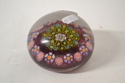 Lot 384 - A large paperweight with floral design