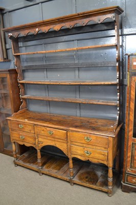 Lot 531 - A George III oak dresser with moulded cornice...