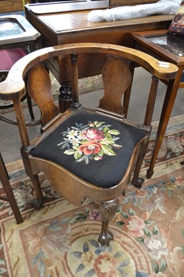 Lot 550 - A George III mahogany corner commode chair...