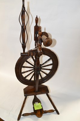 Lot 549 - A 19th Century oak spinning wheel of small...