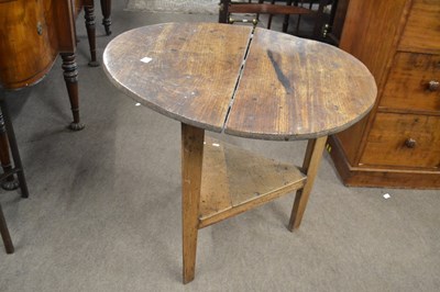 Lot 546 - A Georgian elm cricket table with circular top...