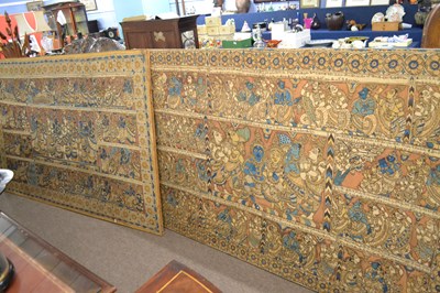 Lot 582 - A pair of Far Eastern fabric panels mounted on...