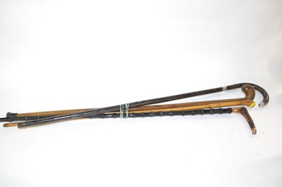 Lot 652 - Mixed Lot: Four various walking sticks to...