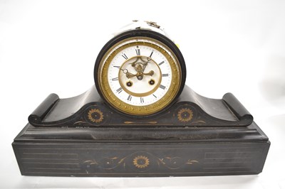 Lot 650 - A Victorian black slate cased mantel clock...