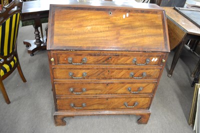 Lot 591 - A Georgian mahogany bureau of typical form...