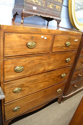 Lot 632 - A late Georgian mahogany chest of two short...