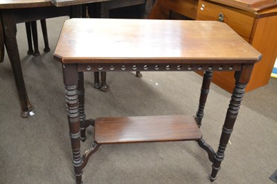 Lot 613 - A late Victorian walnut two tier occasional...