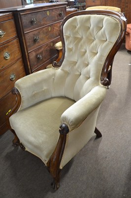 Lot 617 - A Victorian walnut framed button back armchair...