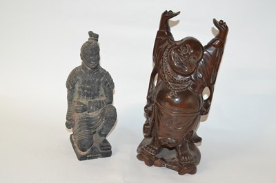 Lot 247 - A Chinese carved hardwood figure of Buddha...