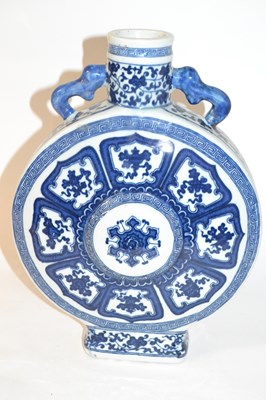 Lot 251 - A Chinese porcelain moon flask with blue and...