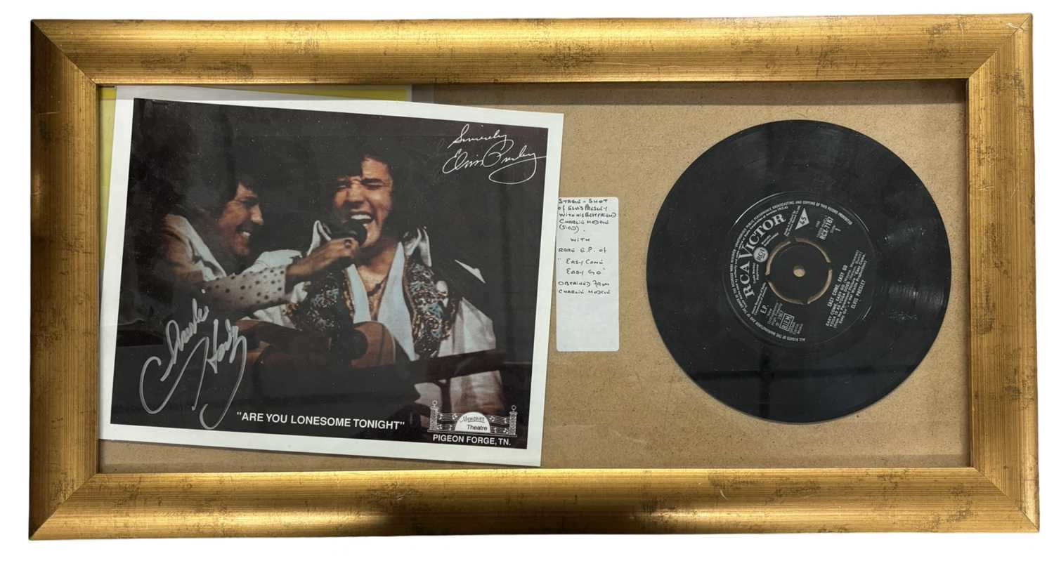 Lot 108 - ELVIS PRESLEY. Stage shot of Elvis Presley...