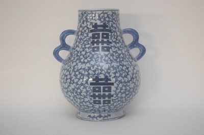 Lot 27 - Chinese vase with double loop handle and...
