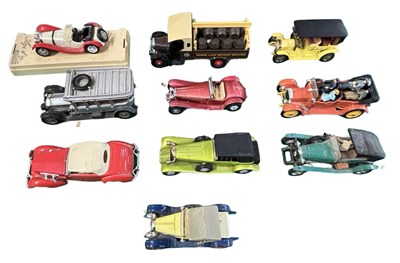 Lot 329 - A collection of various die-cast cars, to...