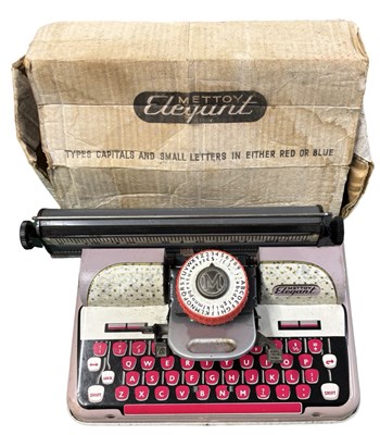 Lot 280 - A vintage tinplate Mettoy typewriter in...
