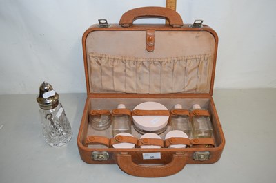 Lot 35 - A vintage travelling vanity set together with...