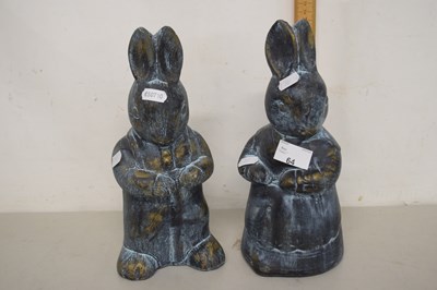 Lot 64 - A pair of pottery rabbits