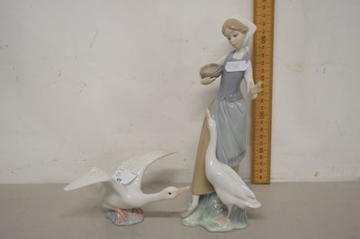 Lot 65 - A Lladro model of a girl with goose and a...