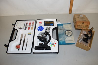 Lot 84 - Two cased students microscopes and a guide book