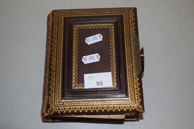 Lot 98 - A Victorian photograph album partially filled