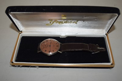 Lot 115 - A gents Omega wristwatch with salmon coloured...