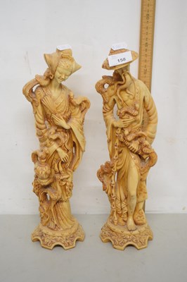 Lot 158 - A pair of Oriental resin figures