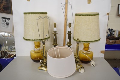 Lot 174 - A collection of table lamps comprising a pair...