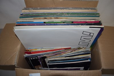 Lot 218 - A box of assorted records and singles