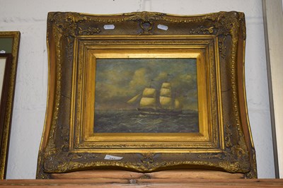 Lot 241 - A reproduction oleograph study of a tall ship...