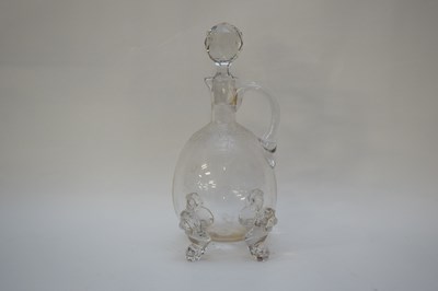 Lot 40 - Glass carafe with moulded feet in the form of...