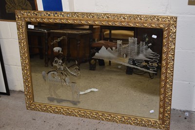 Lot 288 - 20th Century wall mirror with a etched design...