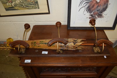 Lot 298 - Coat rack together with a vintage parasol (2)