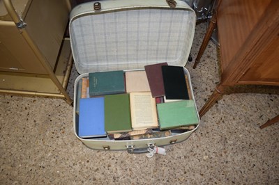 Lot 318 - A suitcase of assorted books