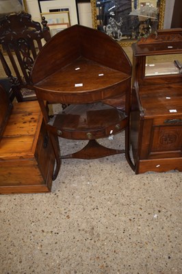 Lot 325 - A Georgian mahogany corner wash stand