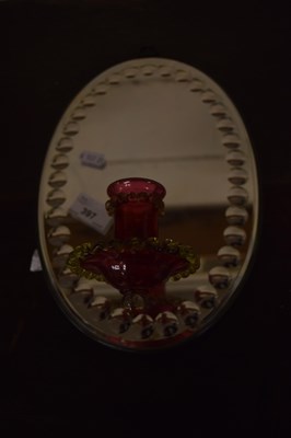 Lot 397 - A mirrored and cranberry glass wall sconce
