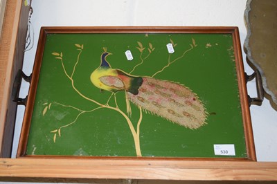 Lot 530 - A tea tray with a picture of a peacock