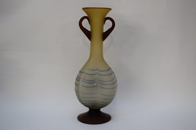 Lot 42 - Art glass vase of dimpled shape with loop...