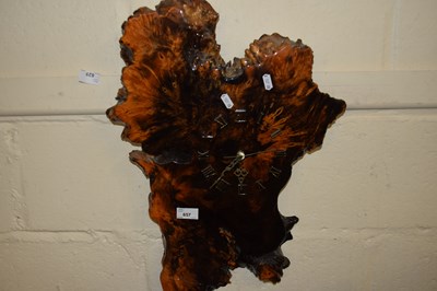 Lot 657 - A hardwood wall clock