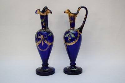 Lot 43 - Pair of 19th century blue glass ewers with...
